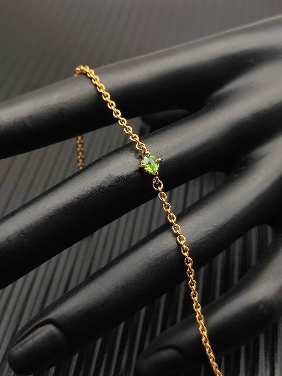David Yurman Elegant Gold Bracelet with Green Gemstone